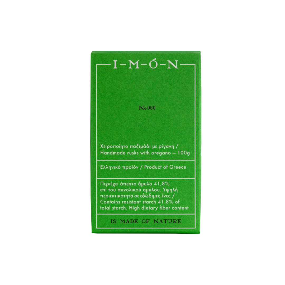 A green rectangular box of I-MÓN No. 983 handmade rice cakes with oregano, featuring white text on a plain white background.