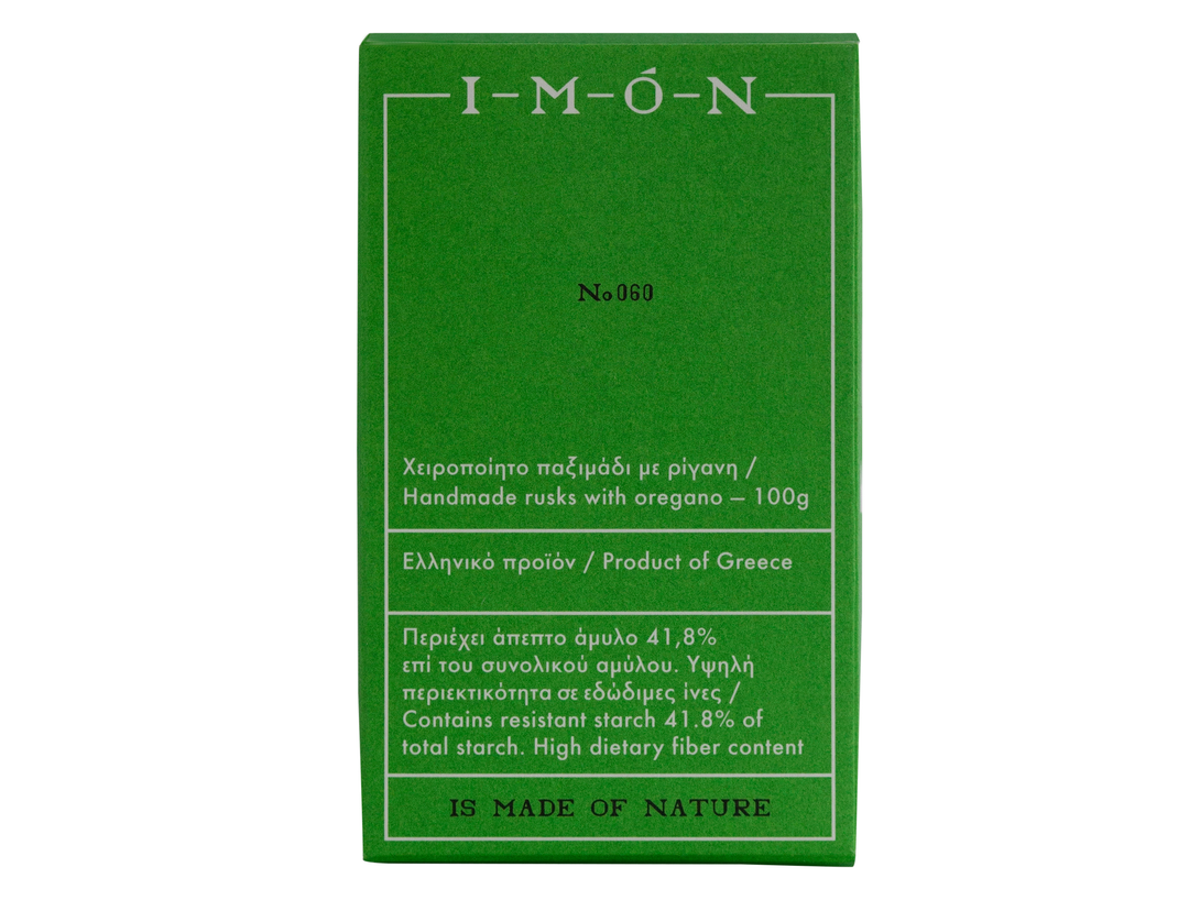 A green rectangular box for I-M-O-N handmade rusks with oregano, featuring white text and borders on a plain white background.