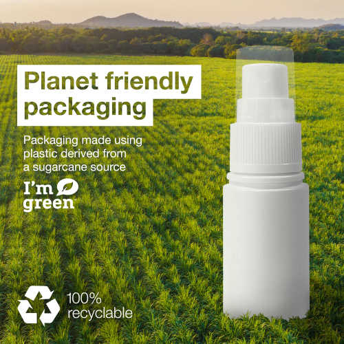 White spray bottle with 'I'm Green' branding against a green field background
