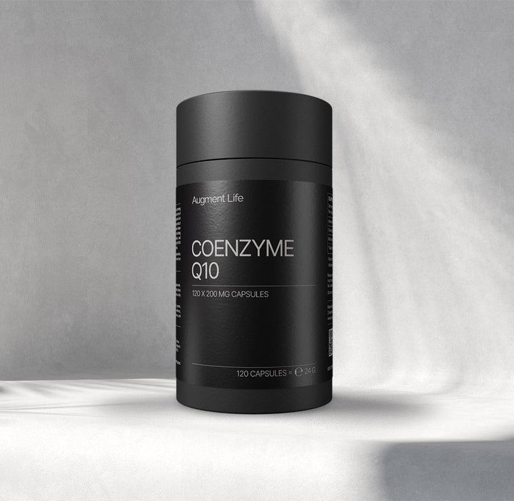 A black cylindrical supplement bottle labeled 'COENZYME Q10' by Augment Life, shown on a plain grey background.