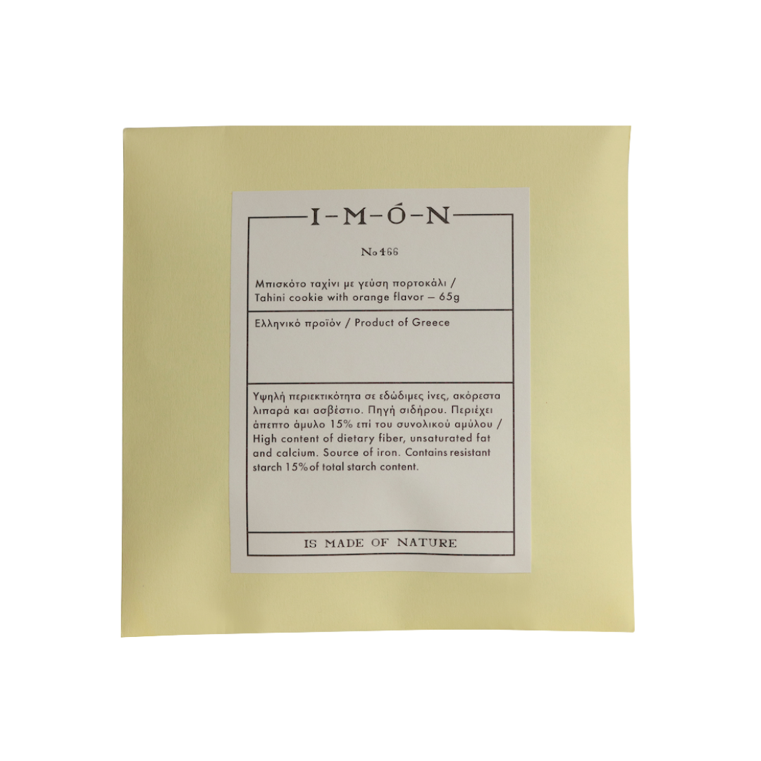 Product packaging with a label on a beige background