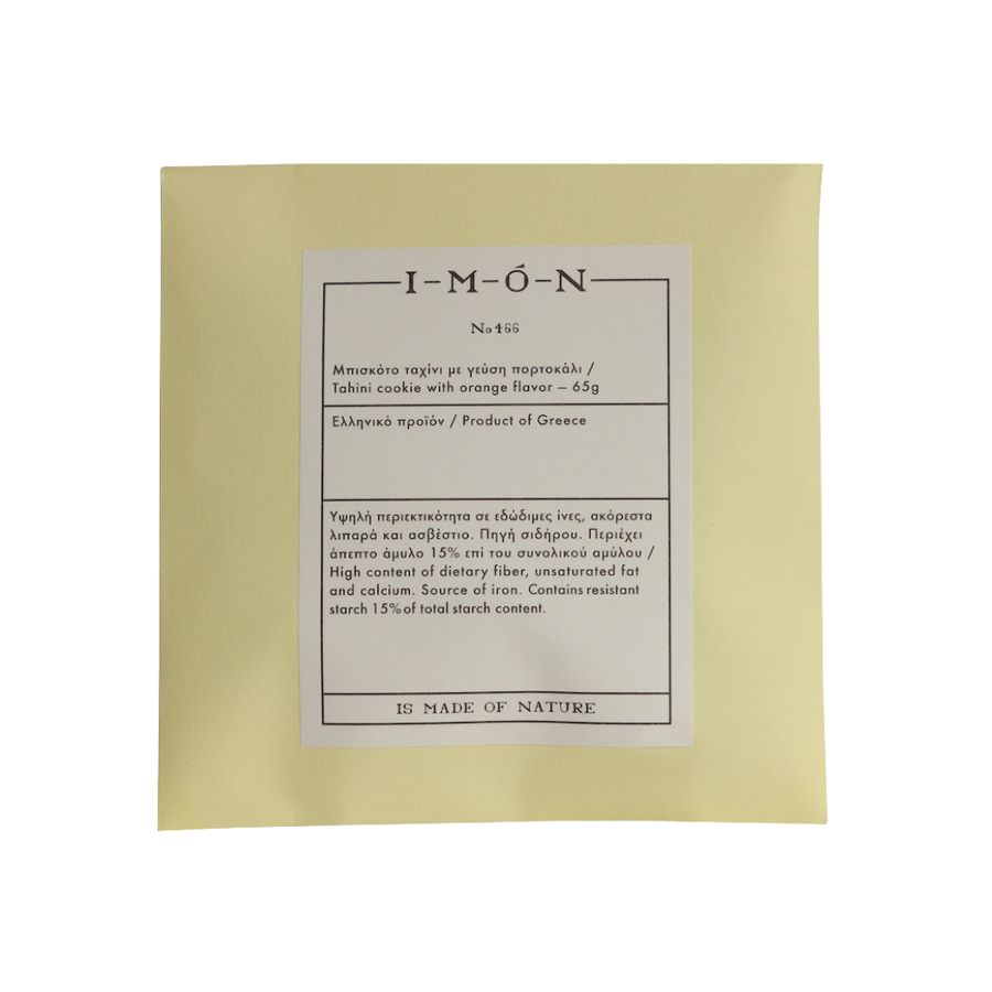 Product packaging with a label on a beige background