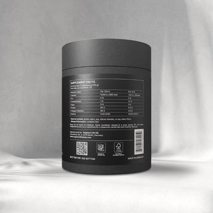 Black supplement container with label on a gray background