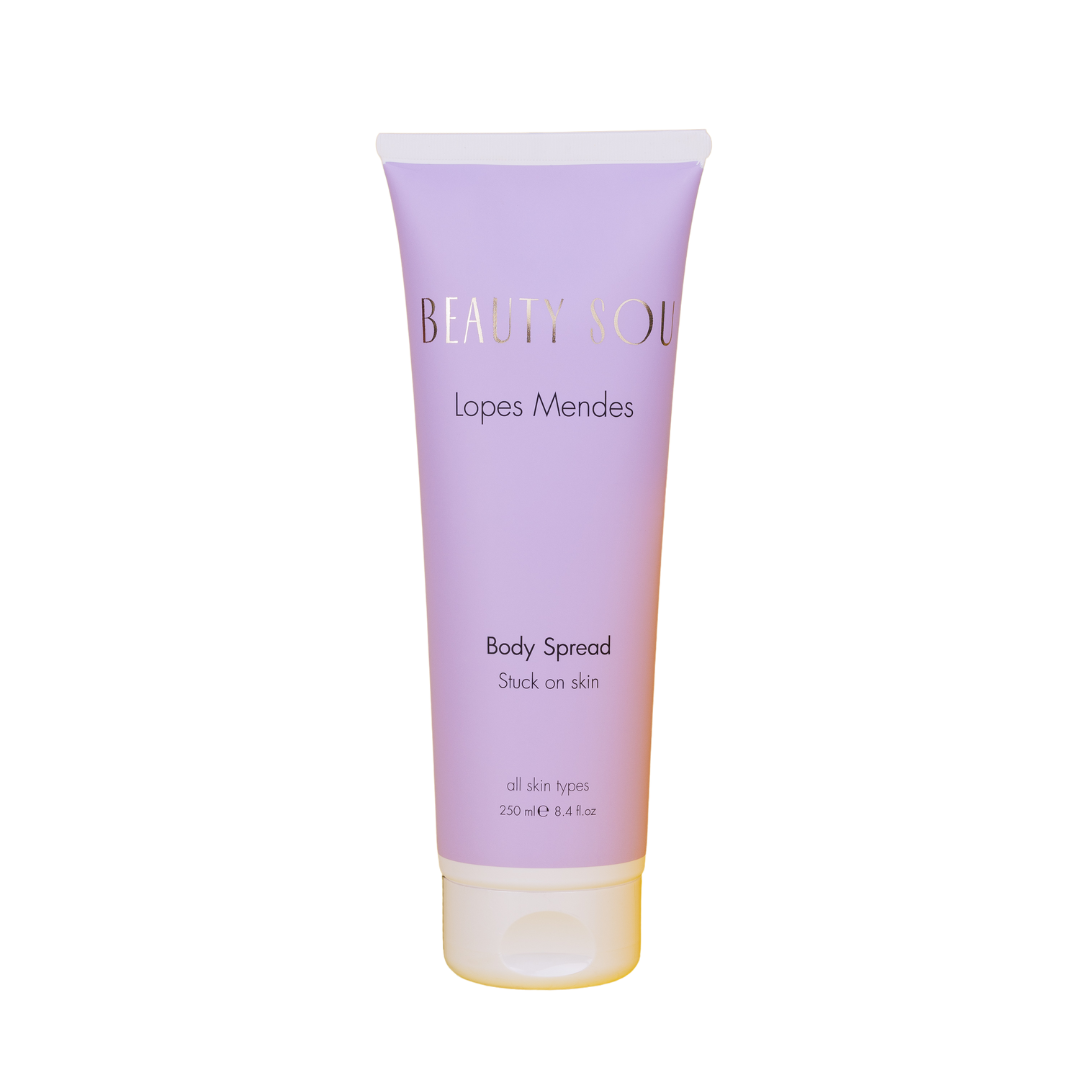 Purple body spread tube with 'Beauty You' branding on a white background