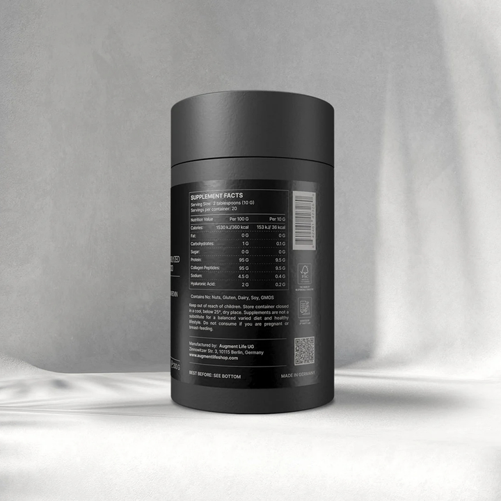 Black supplement container with label on a gray background
